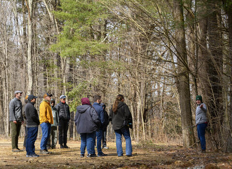 Research Scientist Marlyse Duguid (right) discusses Indigenous and colonial land use history with students and faculty from Salish Kootenai College during a visit to Yale-Myers Forest March 29, 2024. Photo: Mark Conrad.