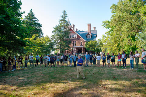 Professor Mark Ashton (center) welcomes students, faculty, and staff to The Forest School at YSE, August 8, 2022. Photo: Chloe Poisson 