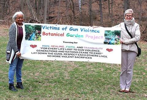 Marlene Miller Pratt, volunteer lead, and Colleen Murphy-Dunning, executive director of Urban Resources Initiative, pose on the site of the New Haven Botanical Garden of Healing Dedicated to Victims of Gun Violence. Photo from URI. 