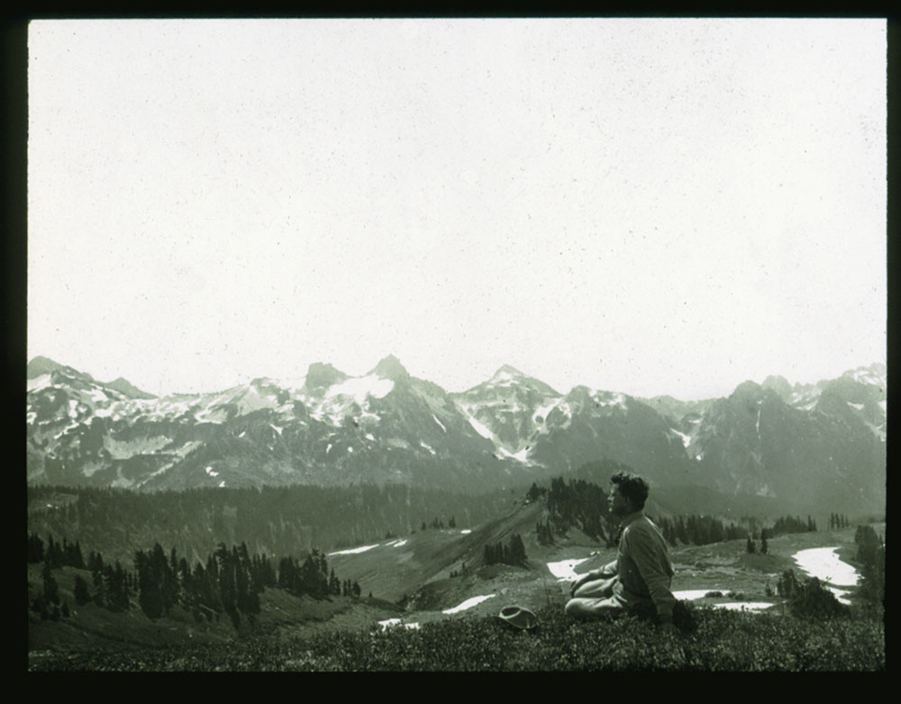 A forester relaxes in Mount Rainier National Park, Washington, in the early 1900s. Credit: Yale University Lantern Slide Collection A forester relaxes in Mount Rainier National Park, Washington, in the early 1900s. Credit: Yale University Lantern Slide Collection